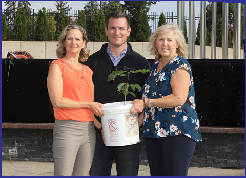 Ford joined with County Executive  Curran accept a white oak tree sapling