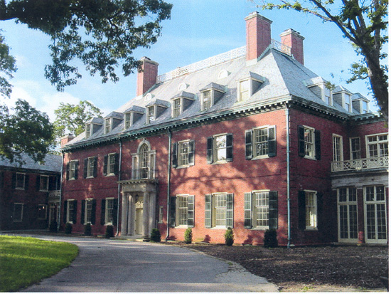 Exterior of large brick manor